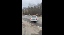 Reckless Lada Granta driver nearly hits woman at crosswalk in Moscow, Russia