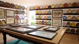 World's largest collection of brewery trays kept in a garage