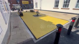 Residents slam bright yellow 'custard corner' painted in historic market town