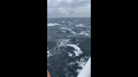 Stranded fisherman clinging to overturned boat rescued