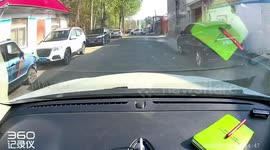 Car crashes into electrical pole, falling onto vehicle in Hebei, China