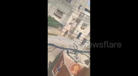 Israeli forces arrest a Palestinian youth during their raid on Beit Furik town, east of Nablus
