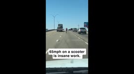 Man Rides High-Speed Scooter on Interstate