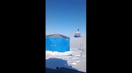 Icebreaker narrowly misses sleeping fisherman on frozen Yenisei River in Krasnoyarsk, Russia