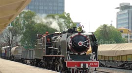 Cambodian Steam Train Departing Pnom Penh Railway Station