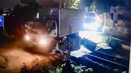 Truck driver stuck on level crossing avoids oncoming train with seconds to spare