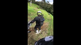 Motorbike mishap as friends slip while climbing in Medellín, Colombia
