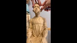 Sculptor creates artwork exploring the trauma of a child