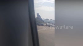 Robbers raid armoured car at airport before fleeing with cash