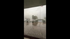 Tropical storm batters office as monsoon seasons nears in Thailand