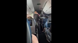 Flight Attendant Rocks Passenger's Baby Mid-Flight