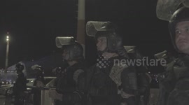 The Bahamas: Salvadoran police escort deported gang suspects to high-security prison