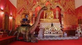 Zen-osaurus! Buddhist temple installs moving diplodocus next to pulpit