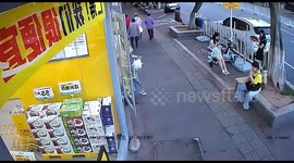 Man crashes into transparent glass in Guangzhou, China