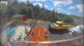 Man Loses Tire and Chases it Down a Steep Hill