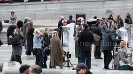 John Krasinski and Sienna Miller see filming in London's Trafalgar Square this afternoon