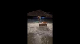 Holidaymakers battered by storm surge at Thai beach