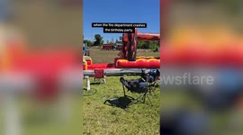 Firefighters surprise kids by soaking backyard waterslide after emergency call