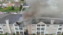 US: Firefighters Battle Wind Driven Blaze At Latitude Apartments In Indianapolis