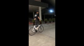 Youngsters ride fixed-gear bicycles across Manila at night