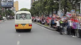 Cambodia: Crowds gather by roadside in Phnom Penh to welcome Xi