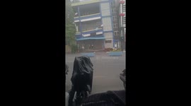 Building weakened by Myanmar earthquake collapses in heavy rain