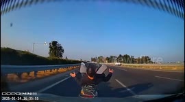 Motorcyclist almost knocked over after car rear-ends them
