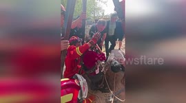 China: Female Police Officer Rescues Toddler Trapped In Narrow Well In Xinjiang