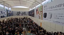 Crowds fill train station as Osaka Expo opens in Japan