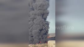 Wind fans flames at recycling plant fire in Almeria, Spain