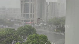 Iron sheet flies through air during storm in Jiangsu, China