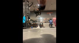 Funny moment: Man blocks camera while girl records her workout set
