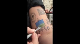 Painting my blank canvas tattoo with a landscape painting using facepaint