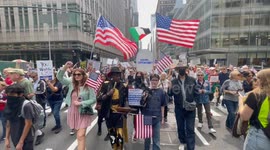 Anti-Trump demonstrators march and chant “No fear, no hate, no ICE in our state”