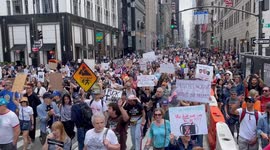 Anti-Trump demonstrators hold protest march in New York City