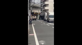 Crane truck’s raised arm causes a dramatic crash