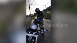 Pup rides with owner in his own custom-built motorcycle pod