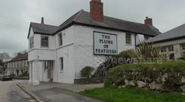 Steam powered transport takes a group for a pub lunch, The Plume of Feathers, Mitchell, Cornwall, UK