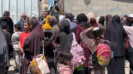 Aid groups distribute meals in Nuseirat refugee camp in enclaved Gaza
