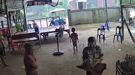 Villagers take shelter as sudden storm hits Thai neighbourhood