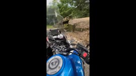 Motorcycle falls into river during off-road ride in Treviso, Italy