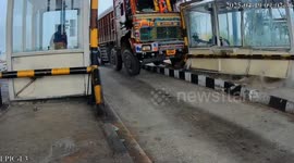 'Drunk' truck driver crashes into toll booth in india
