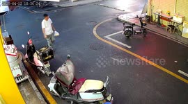 Electric scooter topples into path of pedestrian