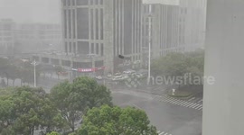 Spinning debris flies through the air during storm in China