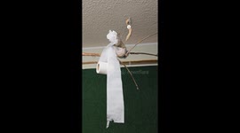 Clever squirrel gathers tissues in a speedy manner to prepare bed for winters