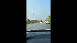 Car seen with huge load stacked onto roof