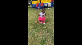 Baby just learning to walk at first birthday party and starts dancing at the end
