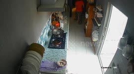 Frying pan catches fire as housewife steps out of kitchen for a moment