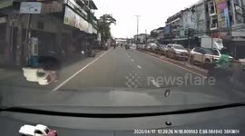 Road rage rider kicks over fellow motorcyclist