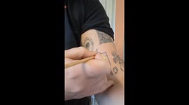 painting my canvas tattoo with a landscape